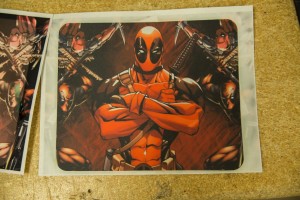 Bright warm reds pop off your own personalized mousepad/
